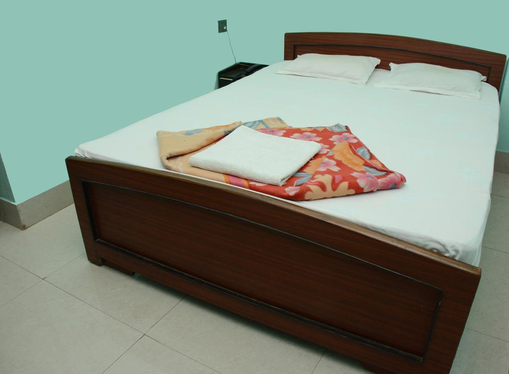 Hotel Nirmal Inn Μπουμπάνεσβαρ Δωμάτιο φωτογραφία