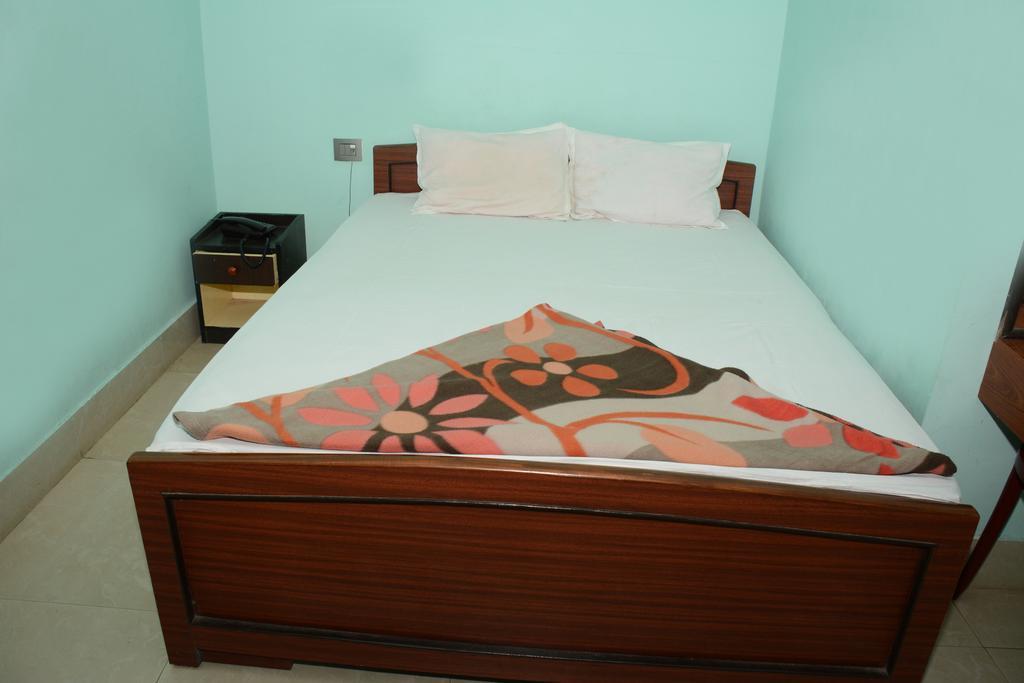 Hotel Nirmal Inn Μπουμπάνεσβαρ Δωμάτιο φωτογραφία