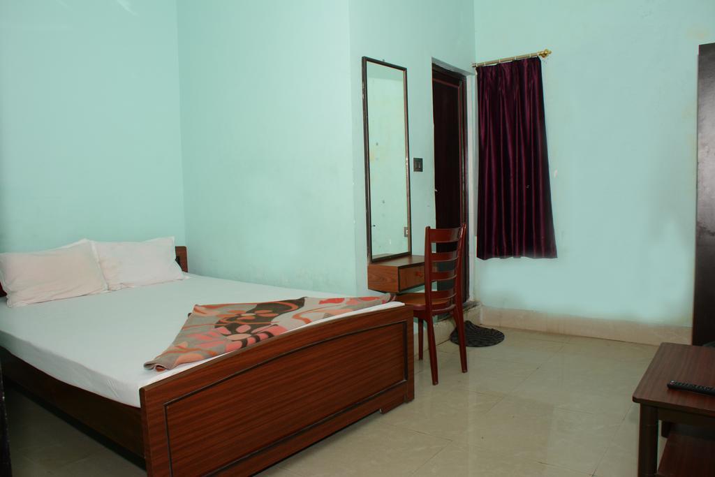 Hotel Nirmal Inn Μπουμπάνεσβαρ Δωμάτιο φωτογραφία