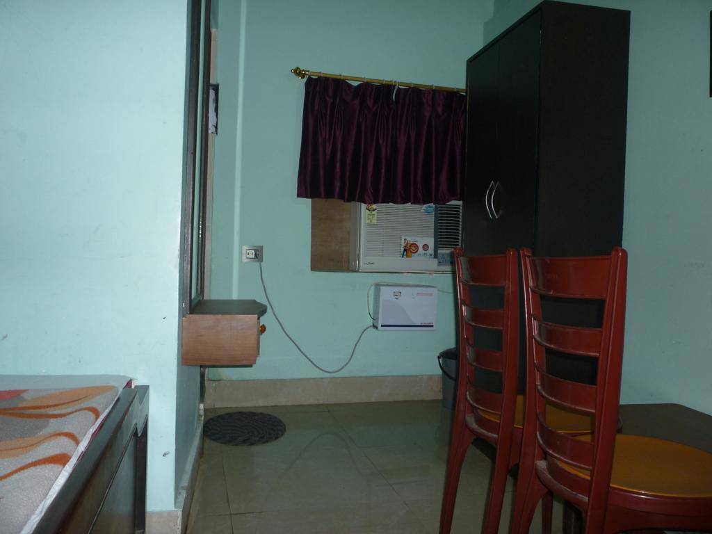 Hotel Nirmal Inn Μπουμπάνεσβαρ Δωμάτιο φωτογραφία